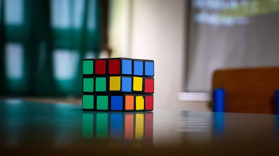 an image of an incomplete rubix cube on the table